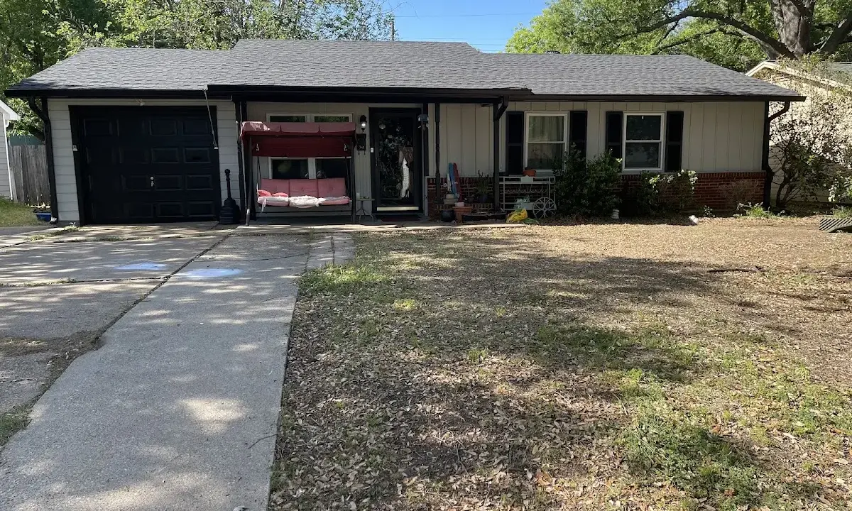 Asphalt Shingle Roof Repair crew at work on a residential roof in Cedar Park